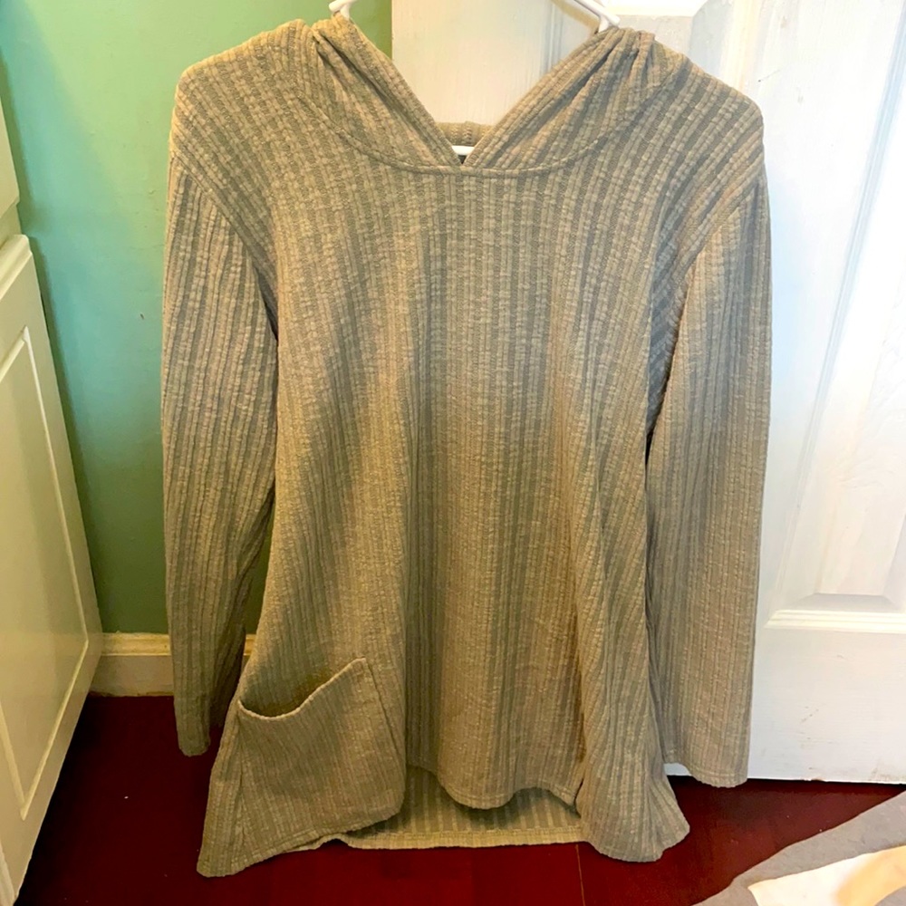 A Lightweight grey pullover w/ a hood.